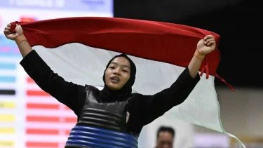 6942a55ca49f0-pesilat-safira-dwi-meilani-raih-emas-di-sea-games-2025_375_211.jpg