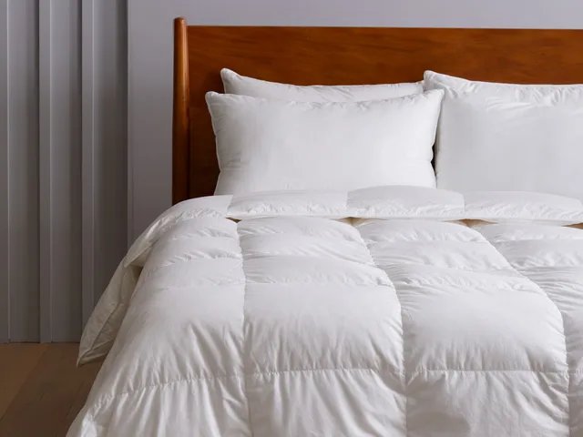 Quince-Premium-Down-Comforter-Lifestyle-Foot-of-Bed-SOURCE-Quince.jpg