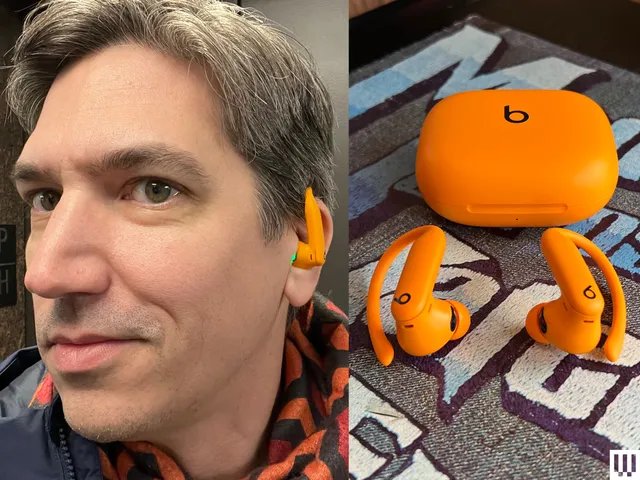 Beats-Powerbeats-Pro-2-selfie_orange-pair-with-closed-case-Reviewer-Photo-SOURCE-Ryan-Waniata.jpg