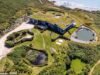 La ‘casa hobbit’, alguna vez votada como propiedad del año, que cuenta disadvantage views panorámicas, techo de pasto y un horno de pizza, sale a la venta por ₤ 4, 5 millones