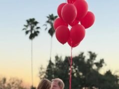 Meghan comparte una foto del sonriente Harry cargando a Lilibet en sus brazos mientras ella dice que ellos y Archie son sus ‘San Valentín para siempre’.