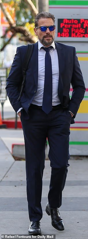 106612121-15585515-Ioan_Gruffudd_arriving_at_court_on_Monday-a-2_1771892371497.jpg